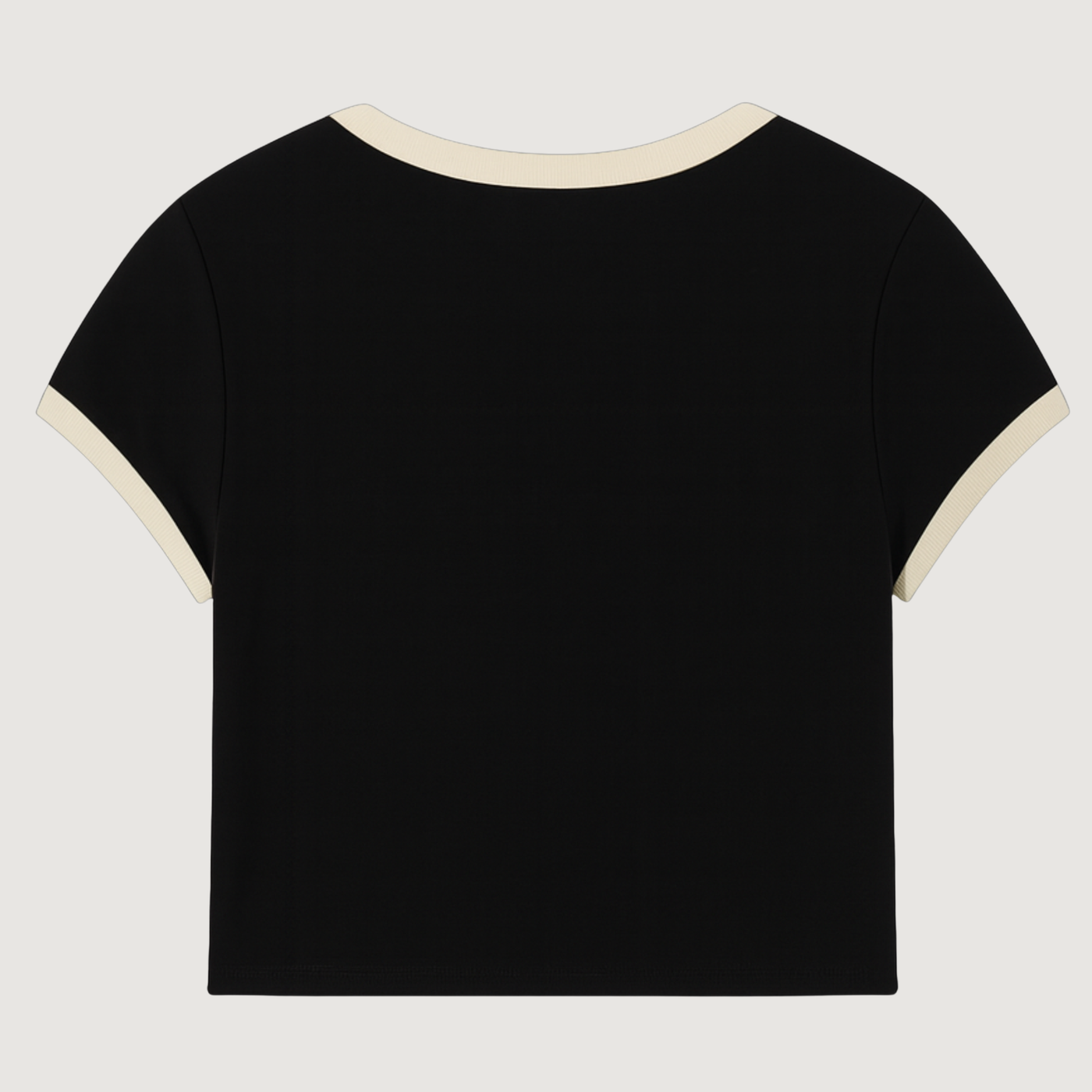 Black t-shirt with white trim on a light gray background