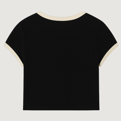Black t-shirt with white trim on a light gray background